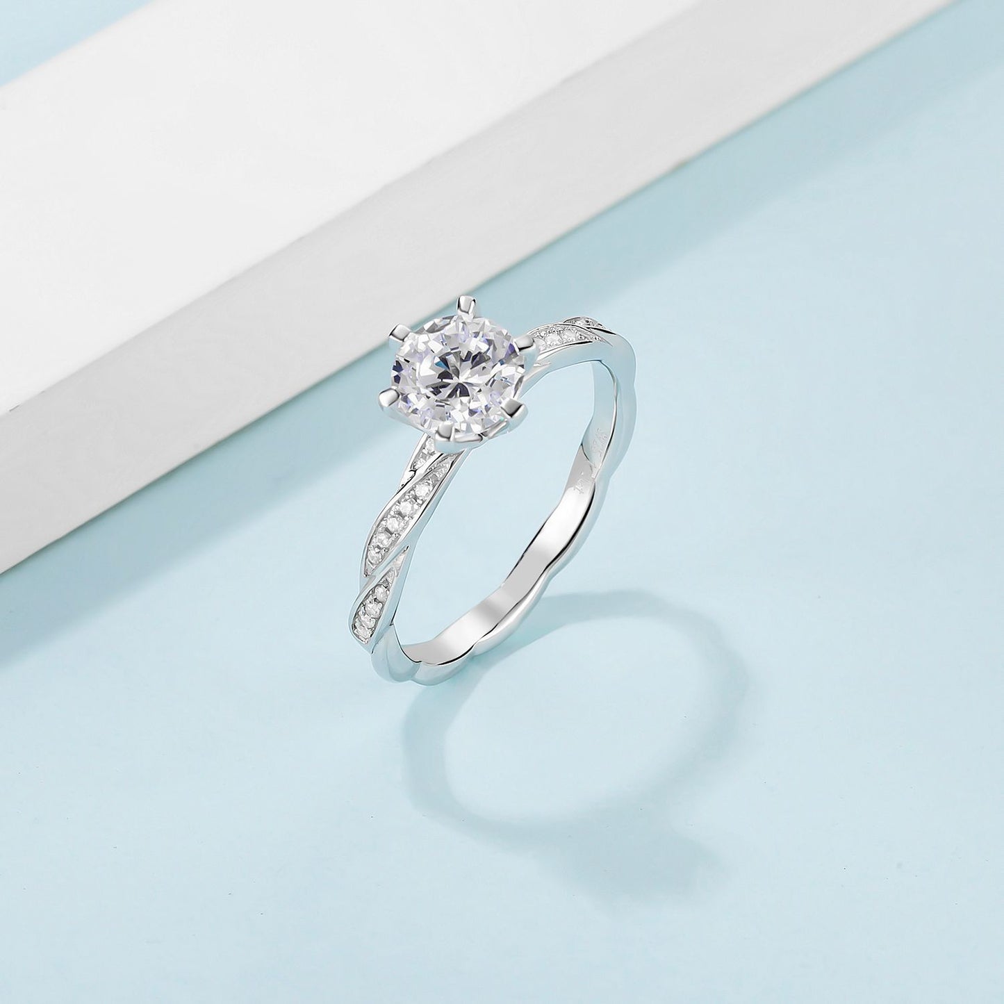 Twisted Arm 1.0 Carat Round Cut Moissanite Engagement Ring