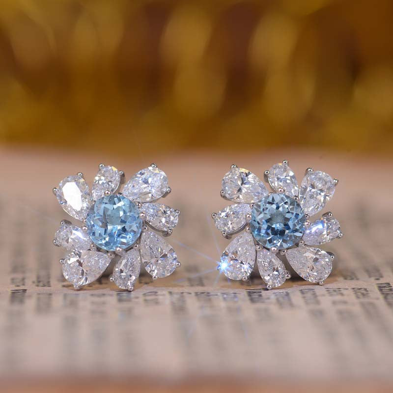 (1.0CT) Sky Blue Natural Topaz 6.5mm Round Cut Annular Petals Silver Studs Earrings for Women