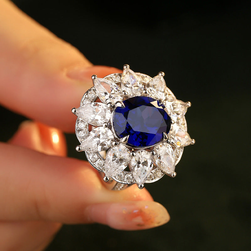 Lab-Created Sapphires Oval Ice Cut Water Drop Soleste Halo Luxurious Silver Ring for Women