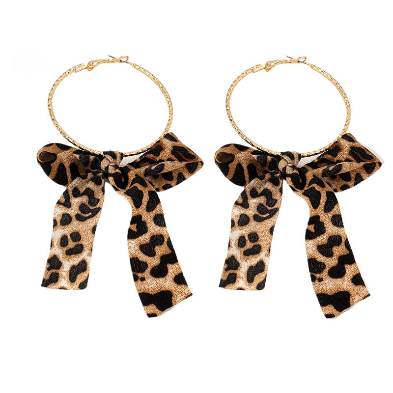Planderful Vienna Verve Earrings – Elegant Metal Circle Bow Design