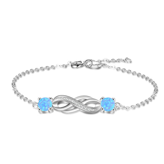 Twist Zircon Infinite Symbol with Double Blue Round Opal Sterling Silver Bracelet