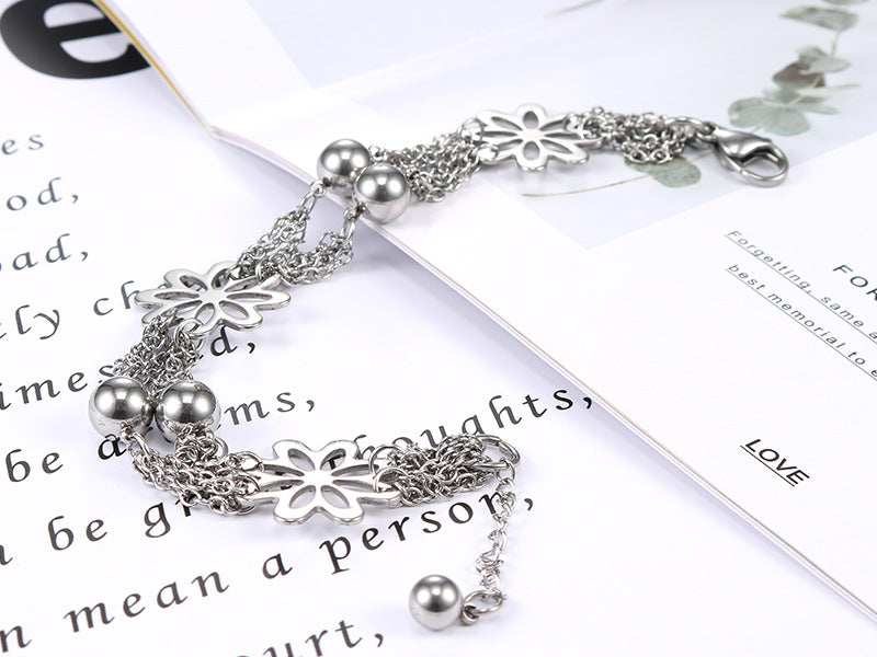 Elegant Flower-Inspired Hollow Titanium Steel Bracelet for Women - Chic Personalized Stainless Steel Jewelry