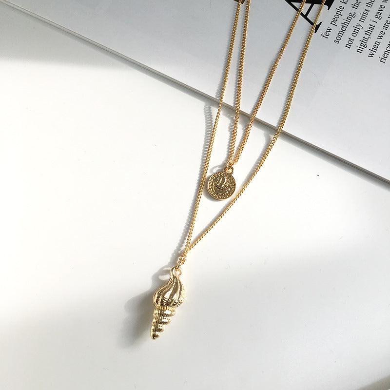 Gold Coin Conch Necklace with Minimalist Design and European Influence