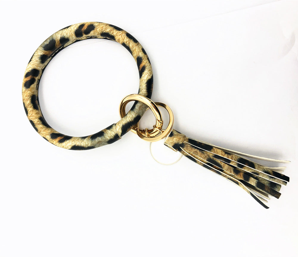 Celebrity Charm Leather Tassel Keychain Bracelet Embellished with Pendant - Vienna Verve Collection