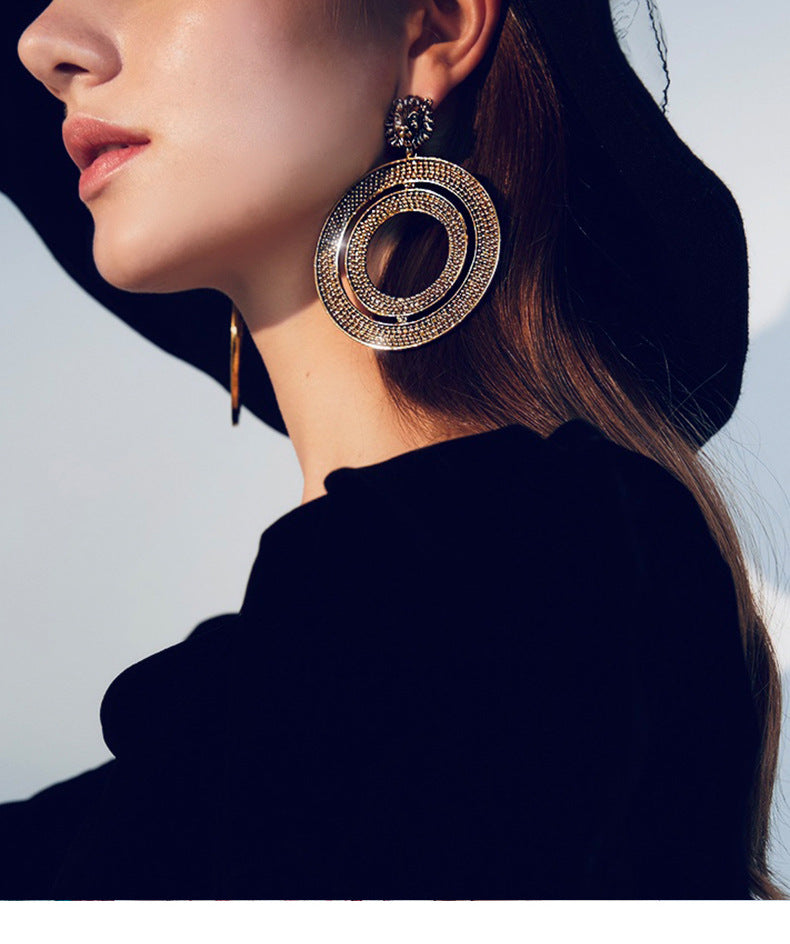 Regal Lion Head Earrings with Metal Texture - Vienna Verve Collection