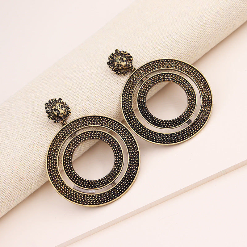 Regal Lion Head Earrings with Metal Texture - Vienna Verve Collection