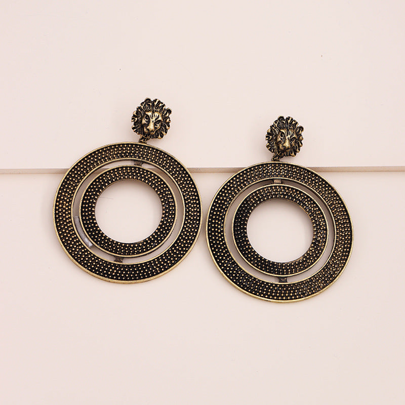 Regal Lion Head Earrings with Metal Texture - Vienna Verve Collection