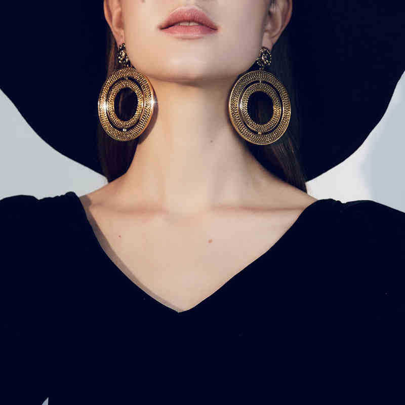 Regal Lion Head Earrings with Metal Texture - Vienna Verve Collection