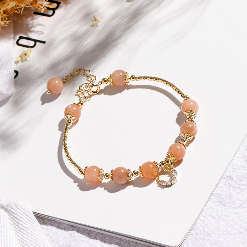 Fortune's Favor Sterling Silver Bracelet with Orange Sunstone and Zircon Moon Beads