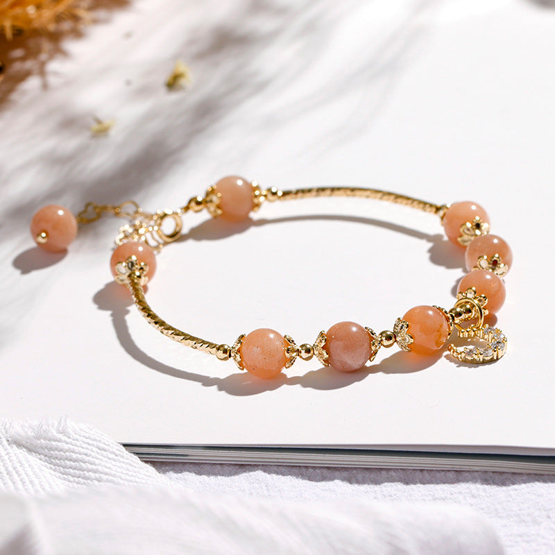 Fortune's Favor Sterling Silver Bracelet with Orange Sunstone and Zircon Moon Beads