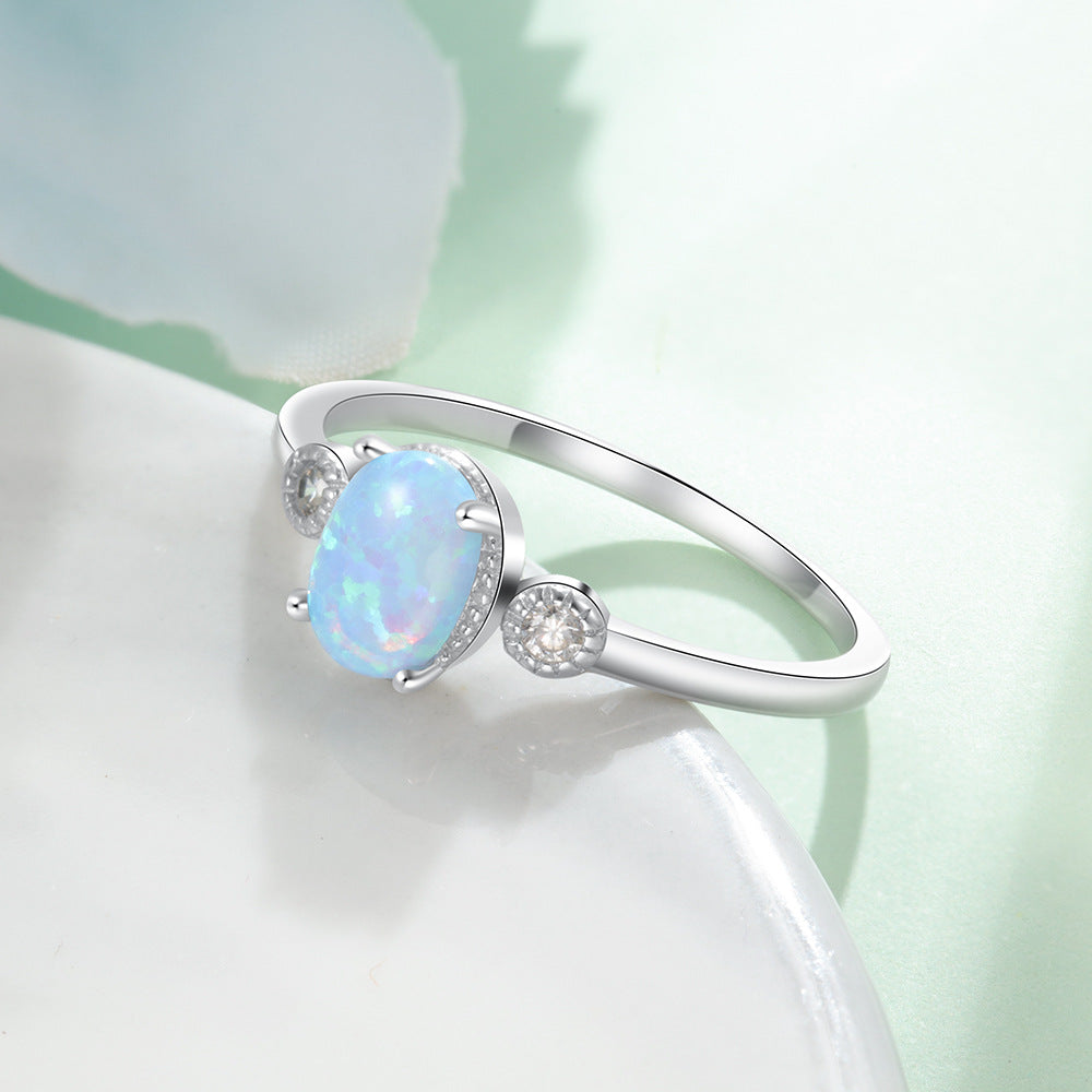 Oval Blue Opal with Two Small Zircon Sterling Silver Ring
