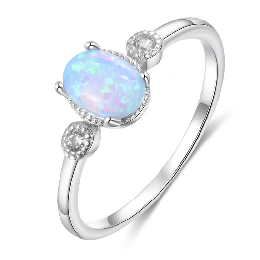 Oval Blue Opal with Two Small Zircon Sterling Silver Ring