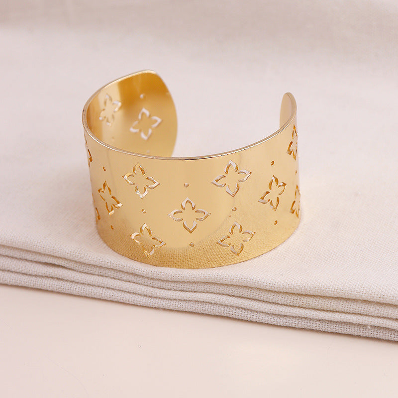 Exaggerated Wide Face Metal Texture Bracelet with Geometric Hollow Star Flower Design