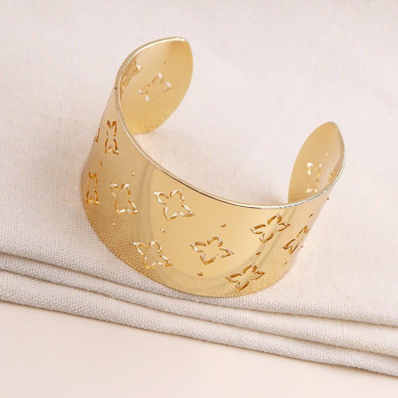 Exaggerated Wide Face Metal Texture Bracelet with Geometric Hollow Star Flower Design