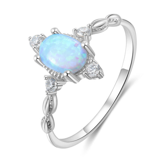 Oval Blue Opal with Four Small Zircon Sterling Silver Ring