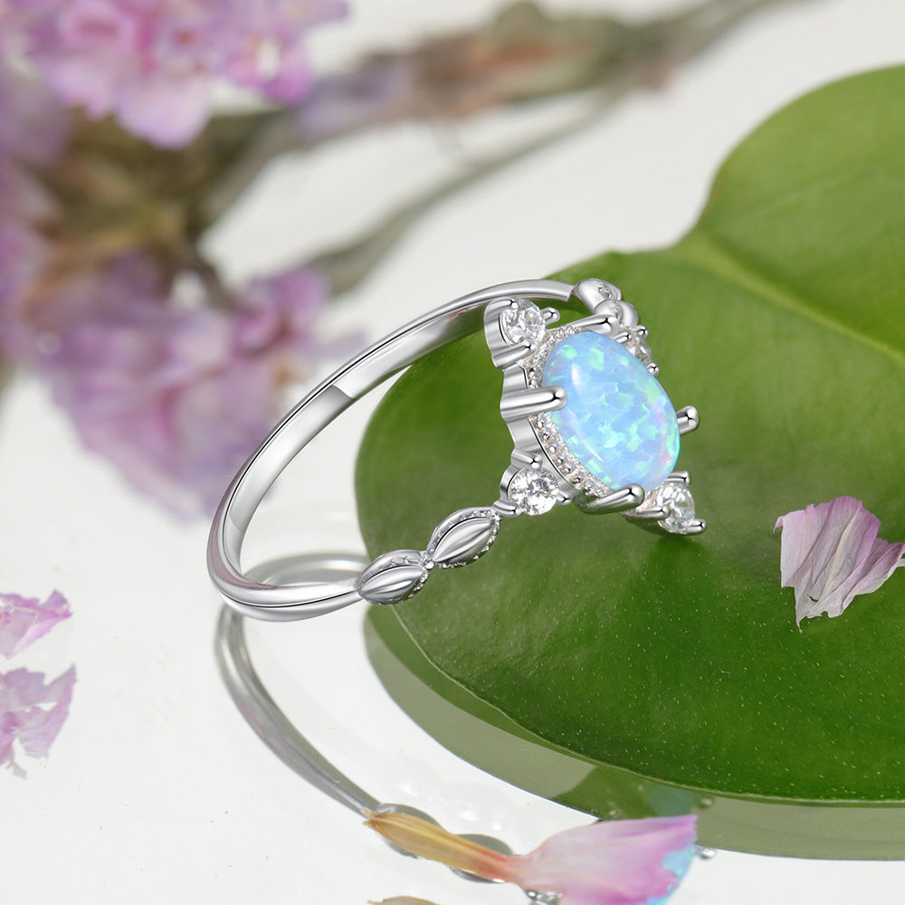 Oval Blue Opal with Four Small Zircon Sterling Silver Ring