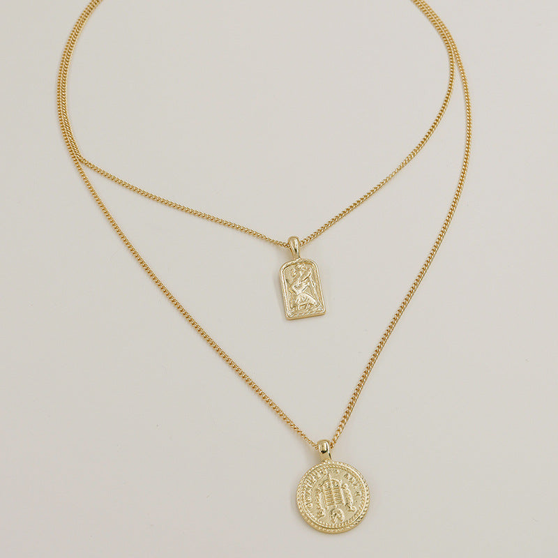 Elegant Gold Coin Pendant Necklace with Geometric Circle Design