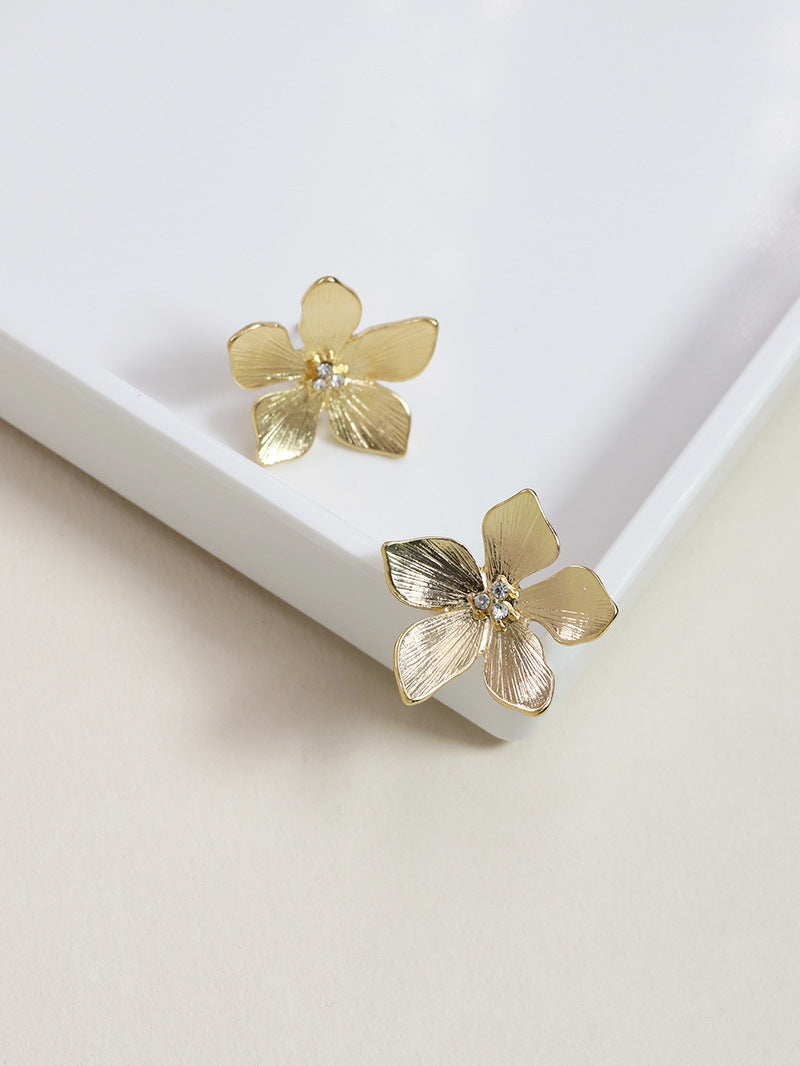 Chic Metal Textured Floral Earrings - Trendy Cross-Border Jewelry with a Modern Touch