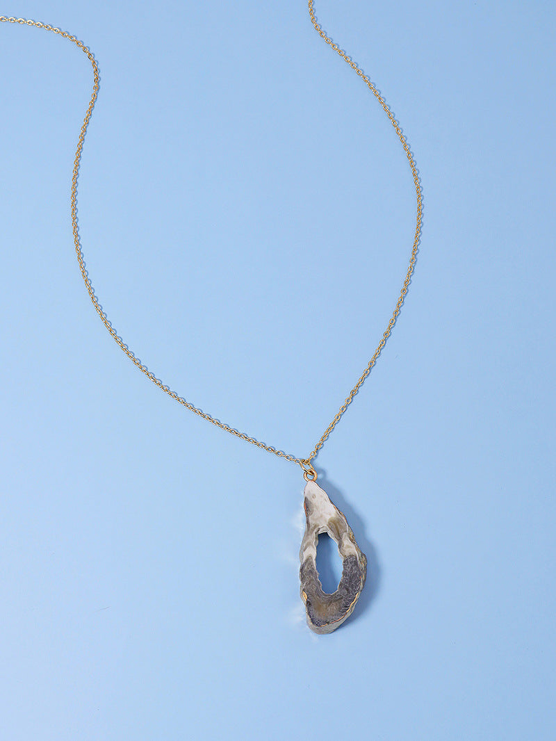 Luxurious Vienna Verve Metal Pendant Necklace with Stone Embellishment