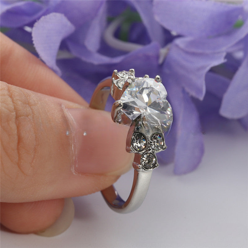 Titanium Steel Hollow White Stone Ring - Retro Trendy Accessory in Stainless Steel