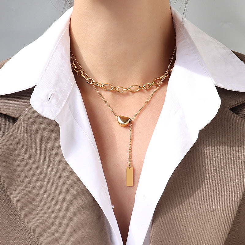 Golden Bean Tassel Necklace with Titanium Clavicle Pendant