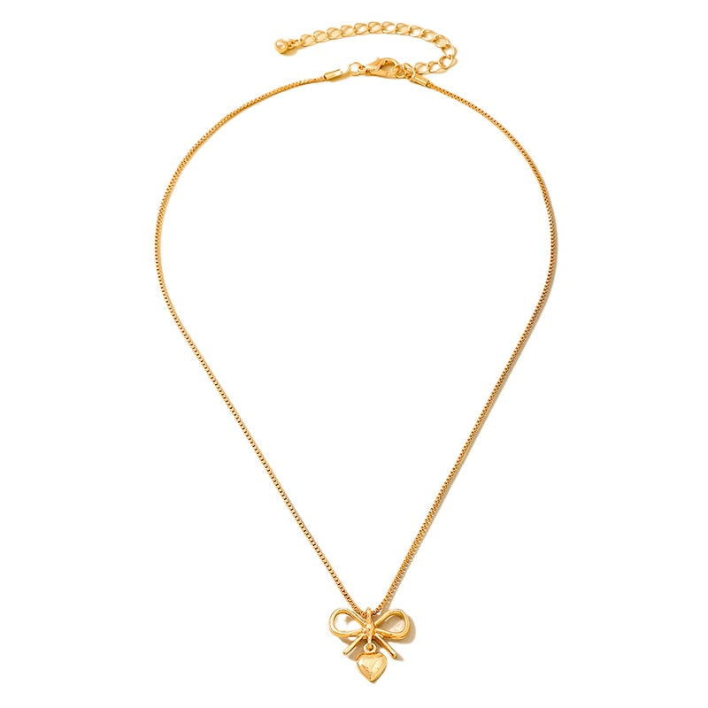 Planderful Vienna Verve Necklace – Elegant Metal Bow Design