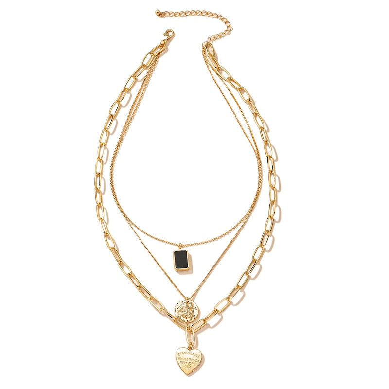 Golden Heart Pendant Collarbone Necklace with Luxe Layered Design