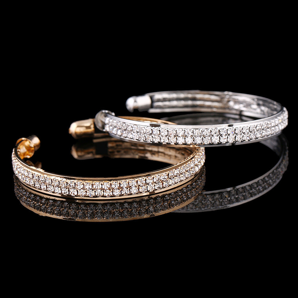 Vienna Verve: Elegant Alloy Bracelet with Rhinestone Inlay