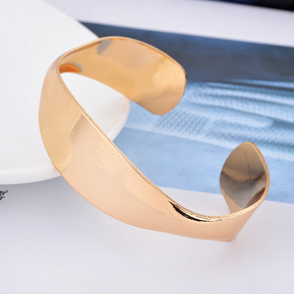Alluring Alloy Metal Bracelet with Unique Napkin Buckle Design for Women