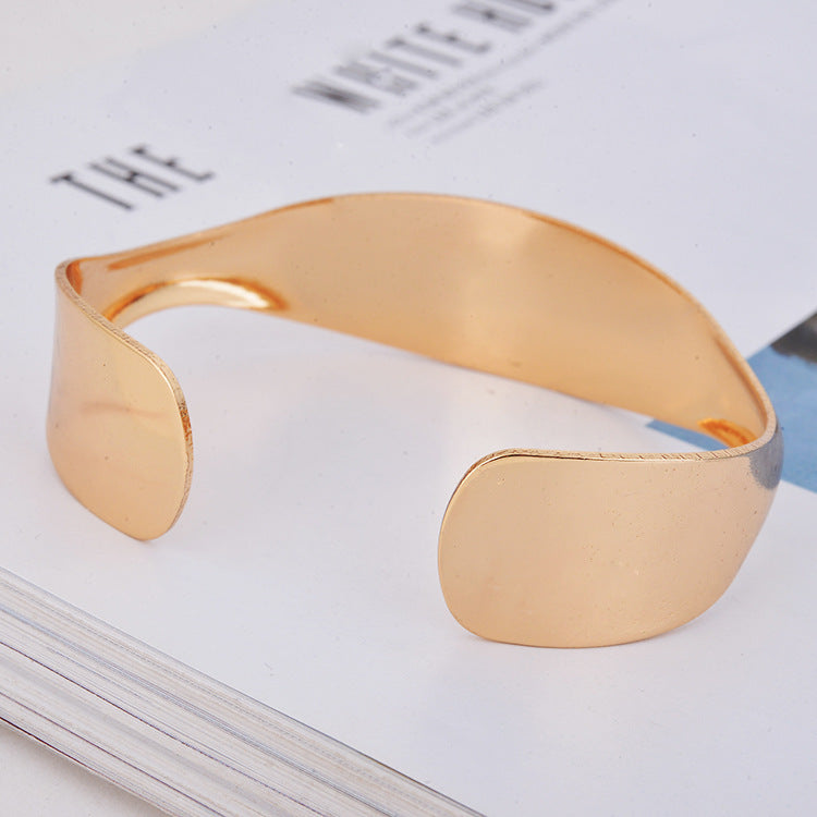 Alluring Alloy Metal Bracelet with Unique Napkin Buckle Design for Women