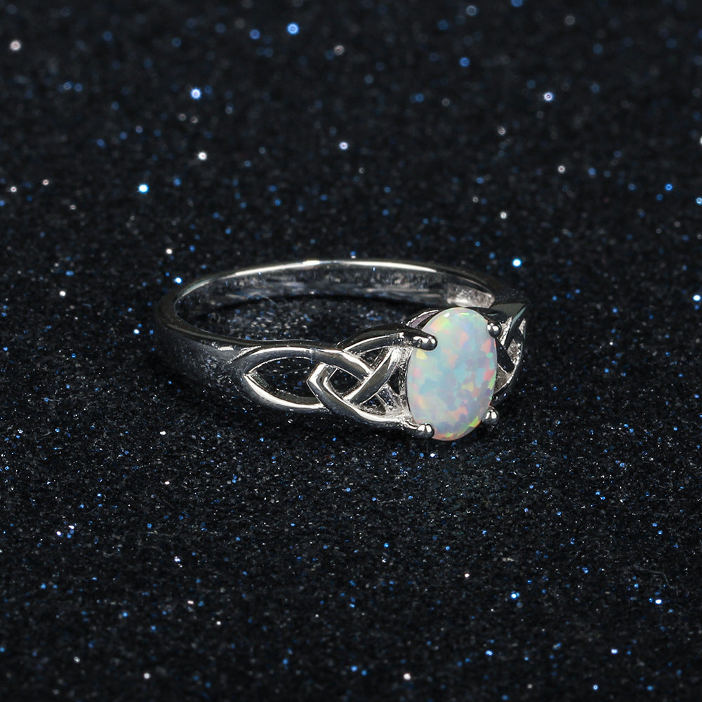 Oval Opal Interweaving Waves Sterling Silver Ring