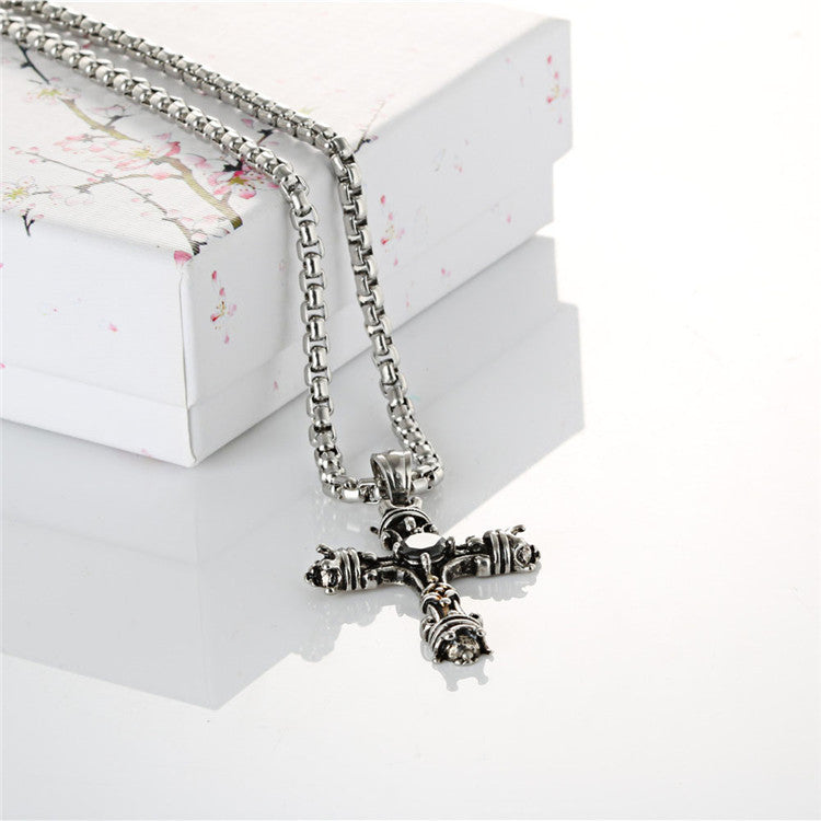 Titanium Steel Black Stone Cross Pendant - Retro Men's Accessory by Planderful