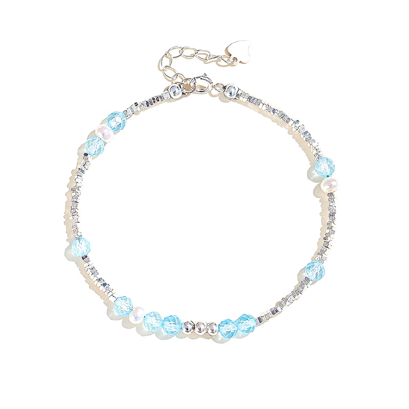 Planderful Fortune's Favor Bracelet – Elegant Blue Topaz and Freshwater Pearl Design