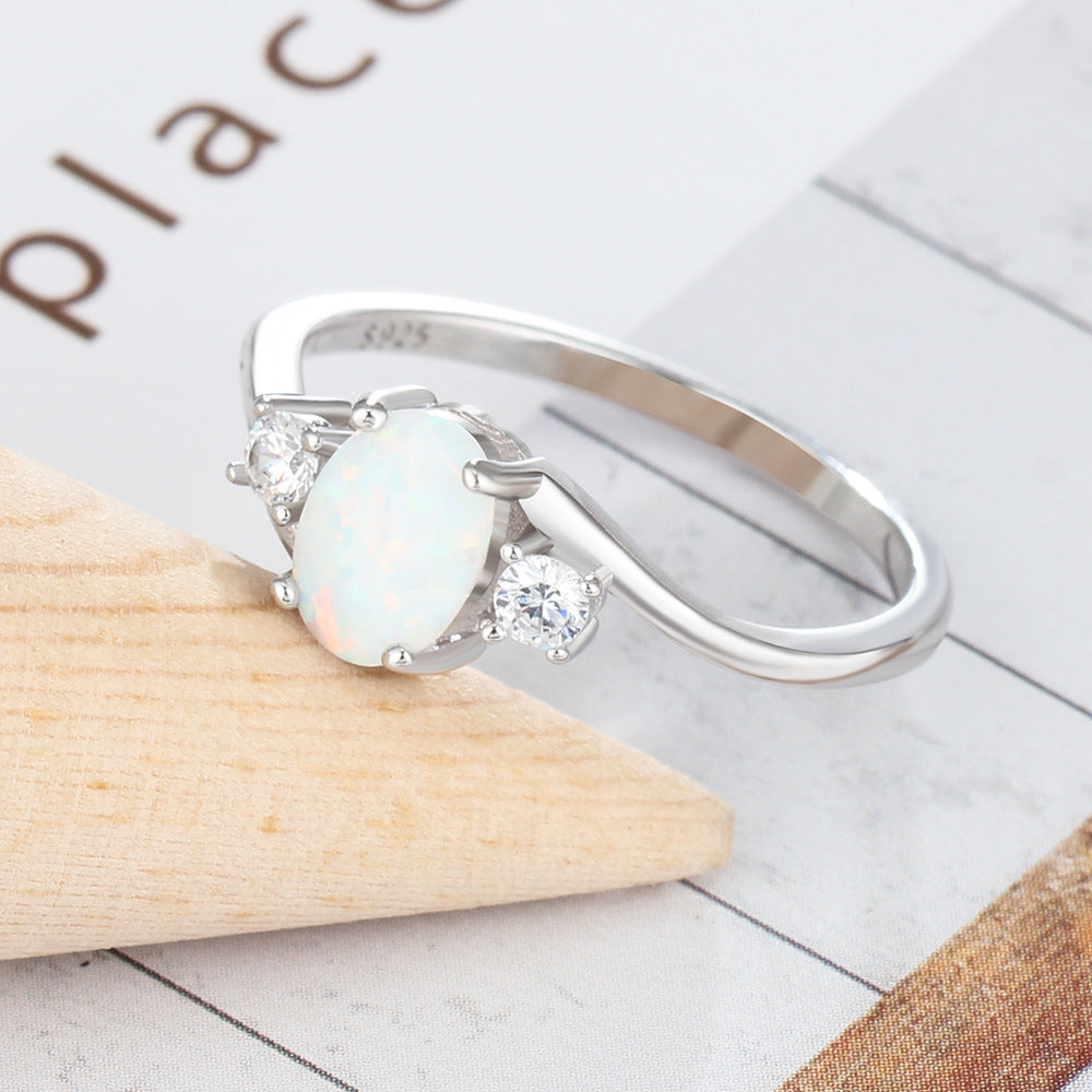 Oval Opal with Two Small Zircon Embrace Arm Sterling Silver Ring