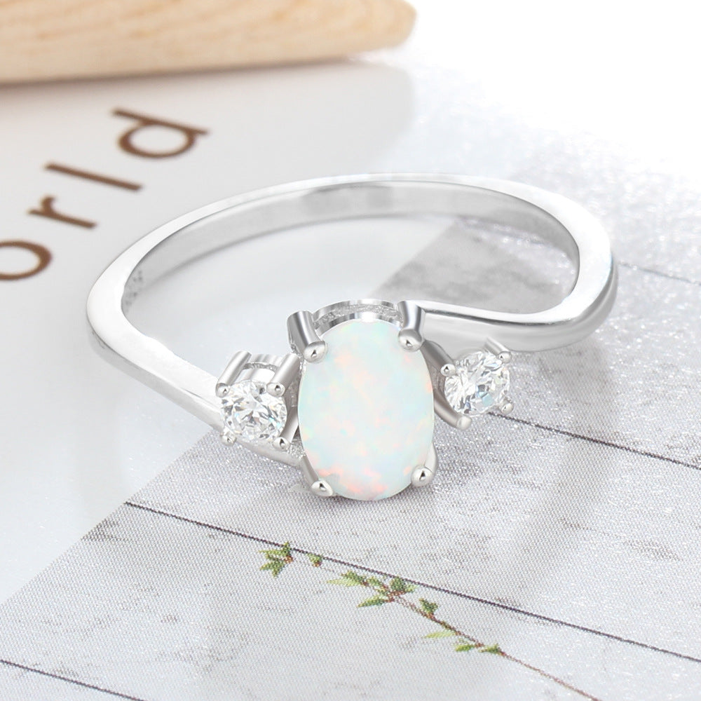 Oval Opal with Two Small Zircon Embrace Arm Sterling Silver Ring