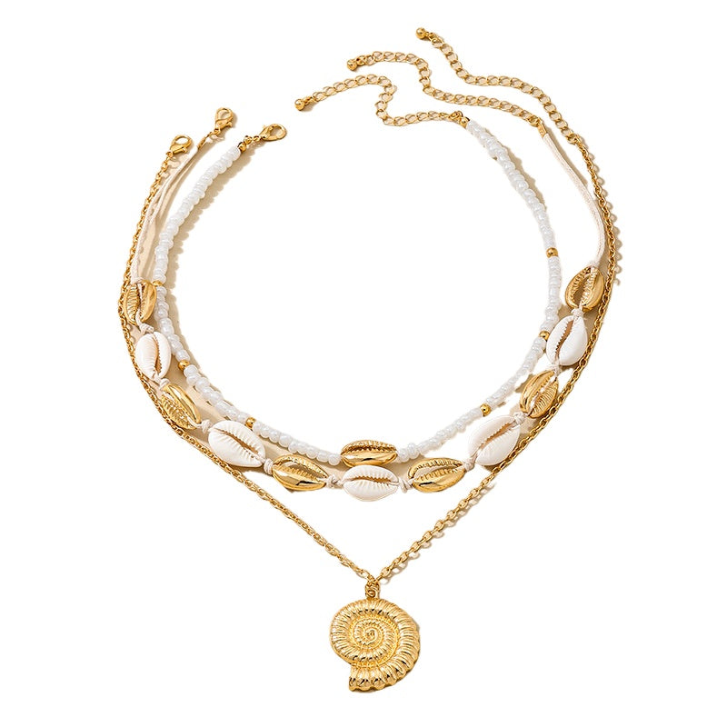 Planderful Vienna Verve Necklace – Beachy Chic Metal Conch Shell Design