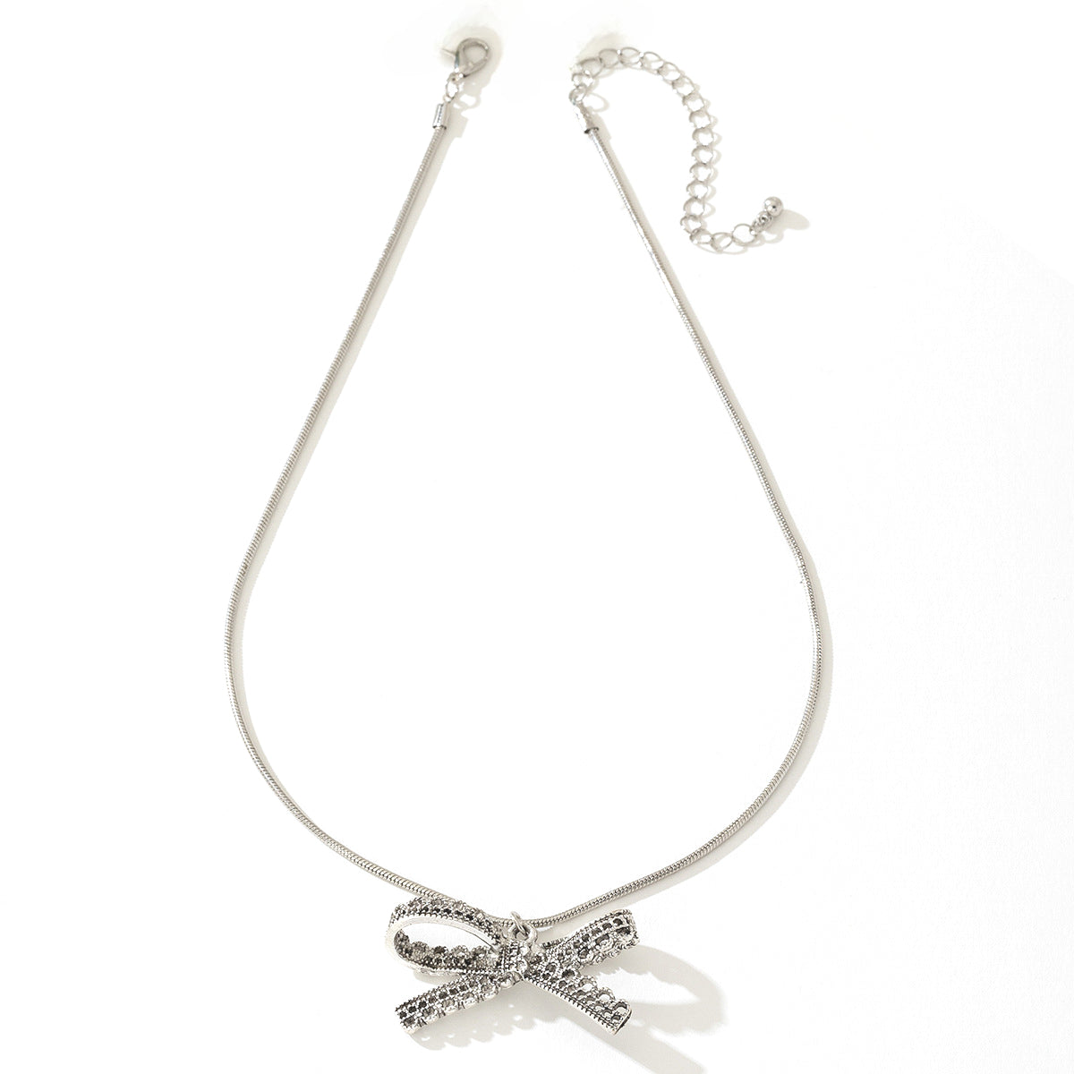 Planderful Vienna Verve Necklace – Fashionable Metal Bow Design