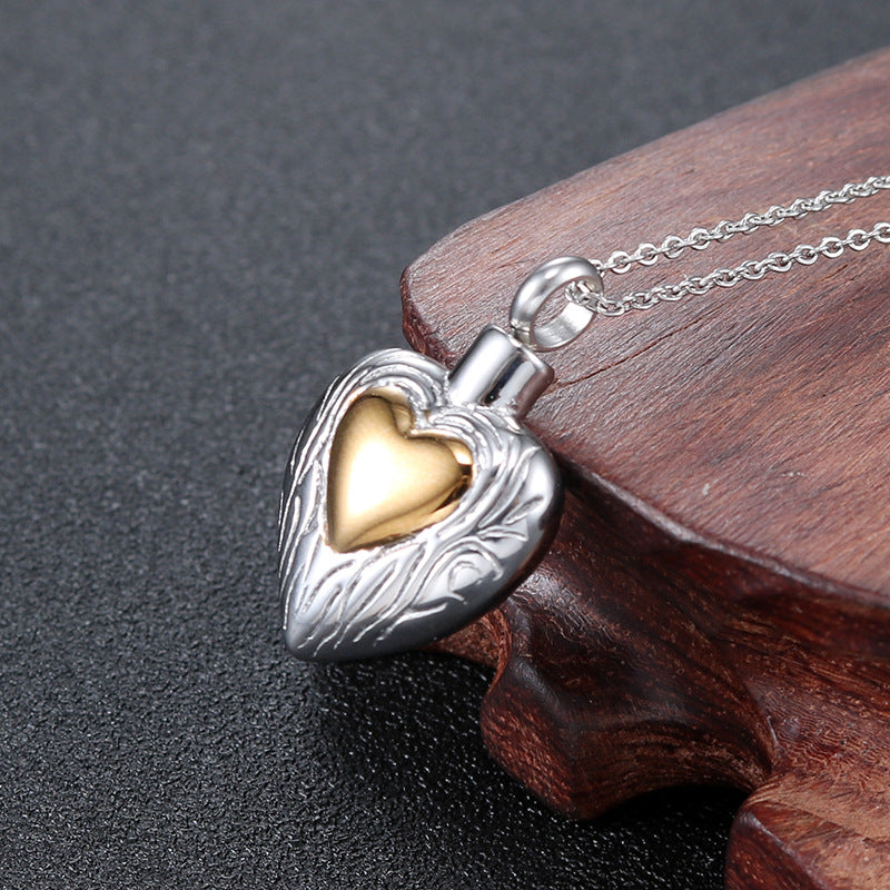 Openable Heart-Shaped Titanium Steel Perfume Bottle Pendant
