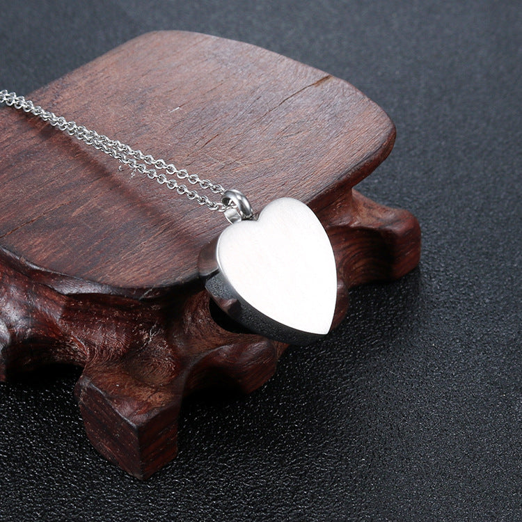 Titanium Steel Heart Pendant with Paw Print Urn for Pet Memorials