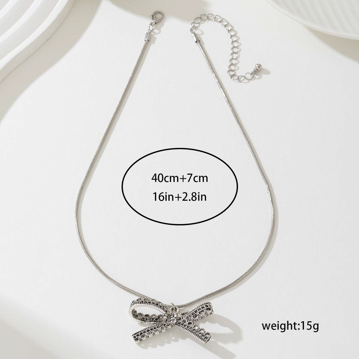 Planderful Vienna Verve Necklace – Fashionable Metal Bow Design