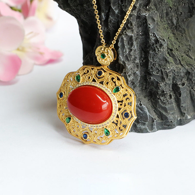 Egg-Shaped Sterling Silver Necklace with South Red Agate Pendant and Zircon Hollow Detail