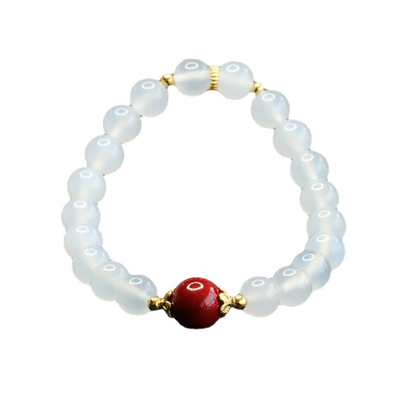 Fortune's Favor Sterling Silver Bracelet with Cinnabar Bead and Natural White Chalcedony
