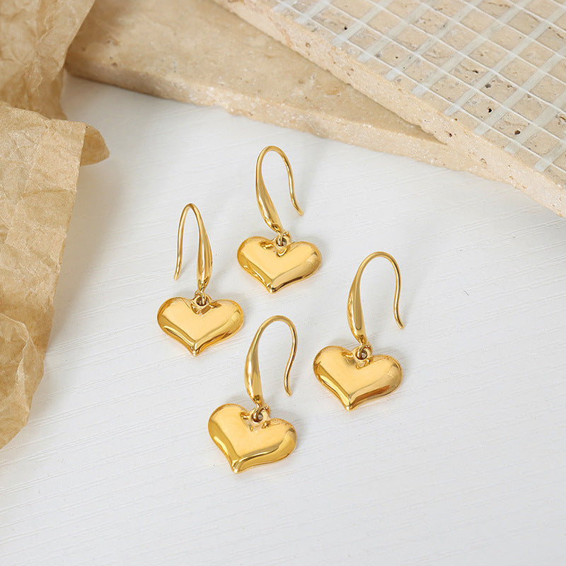 Love Infusion Gold-Plated Heart Earrings with Unique Design and Metal Ear Hooks