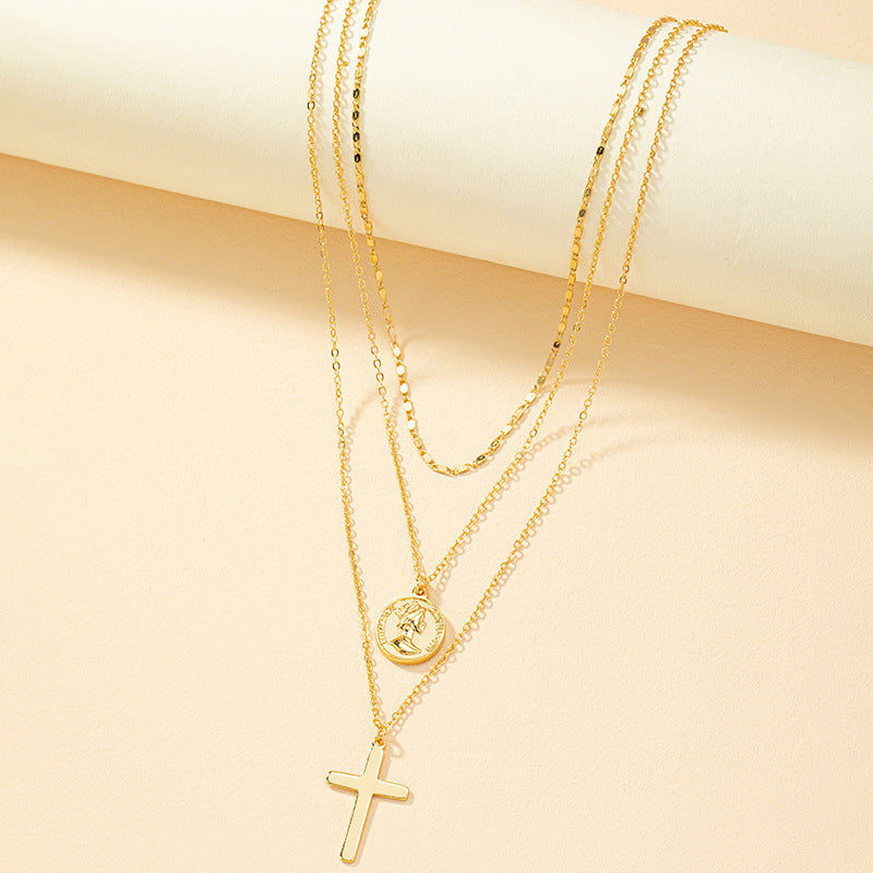 Elegant Layered Cross Pendant Necklace in Modern Style