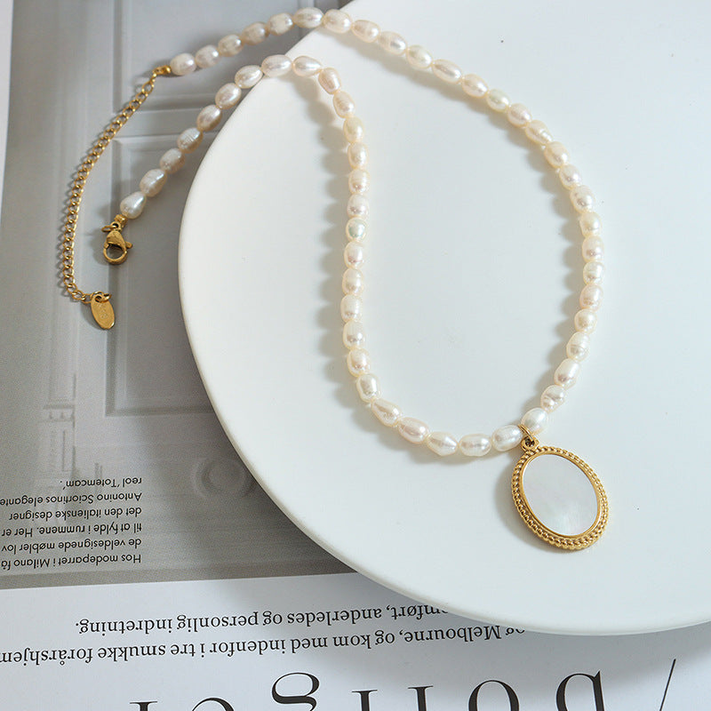 Elegant French Pearl Necklace with Sea Shell Pendant