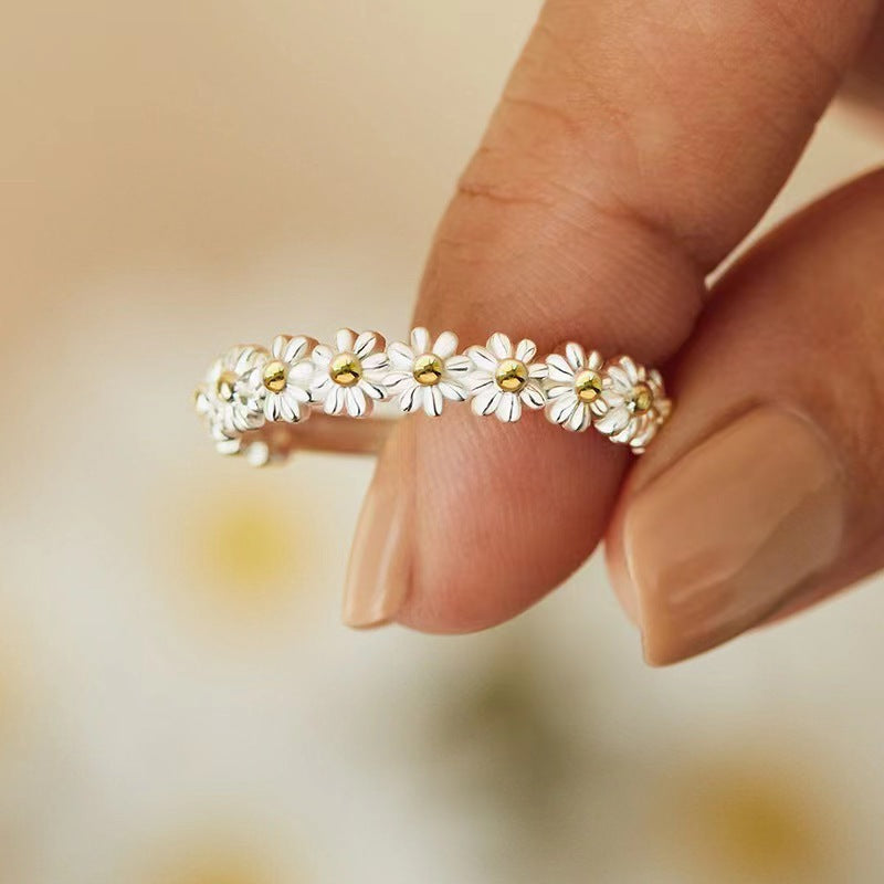 Row of Sweet Little Daisy Opening Sterling Silver Ring