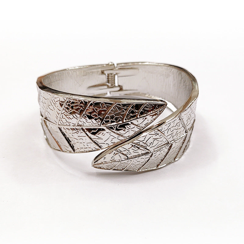Vienna Verve Exaggerated Silver Bracelet with Leaf Design