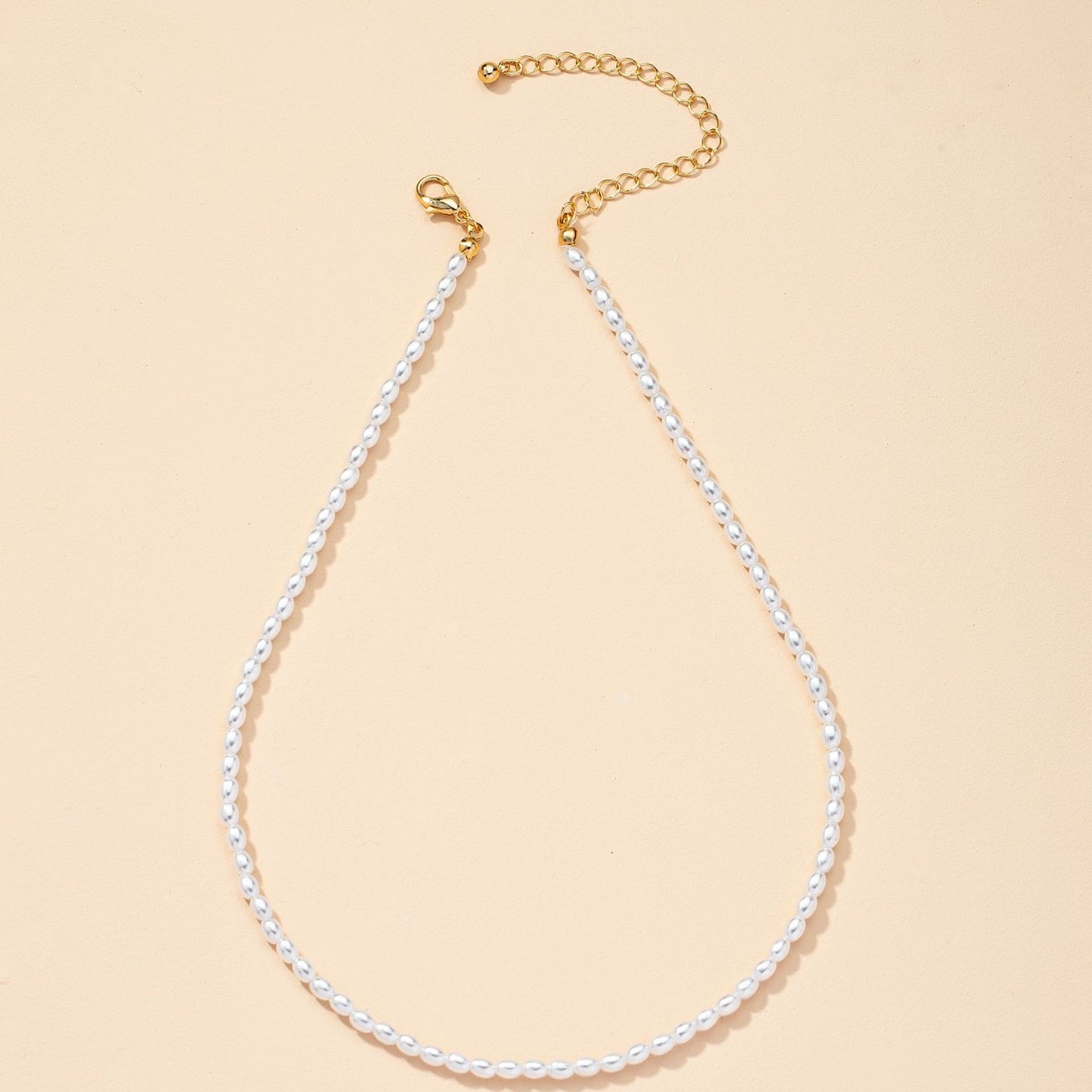 European and American Retro Pearl Necklace with Irregular Charms and Cross Pendant