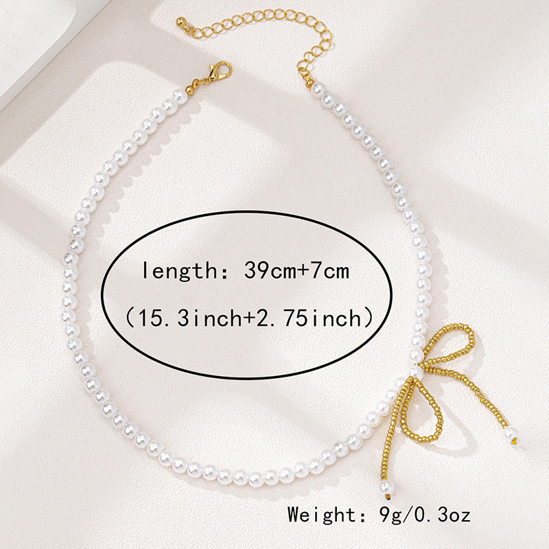 Planderful Vienna Verve Necklace – Exquisite Imitation Pearl Bow Design