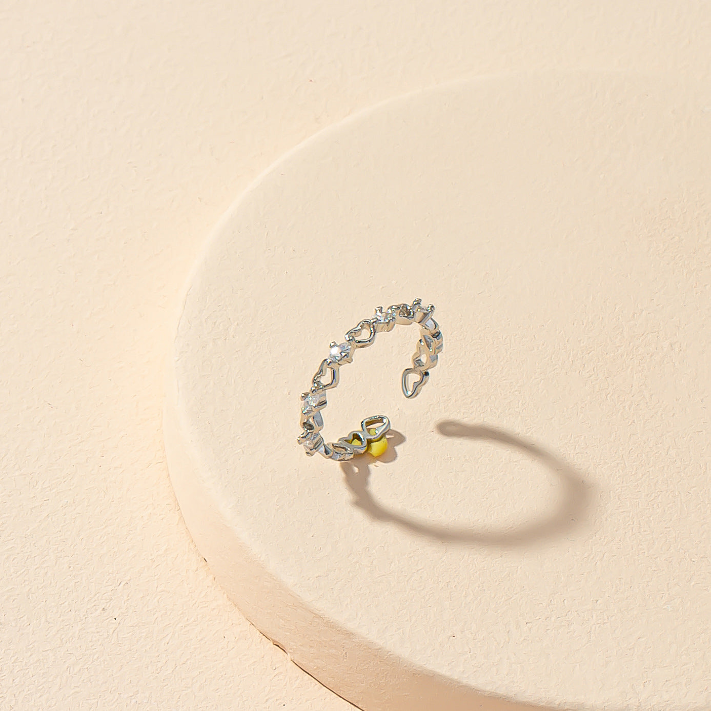 Heartfelt Elegance: Contemporary Heart Opening Ring with a Twist